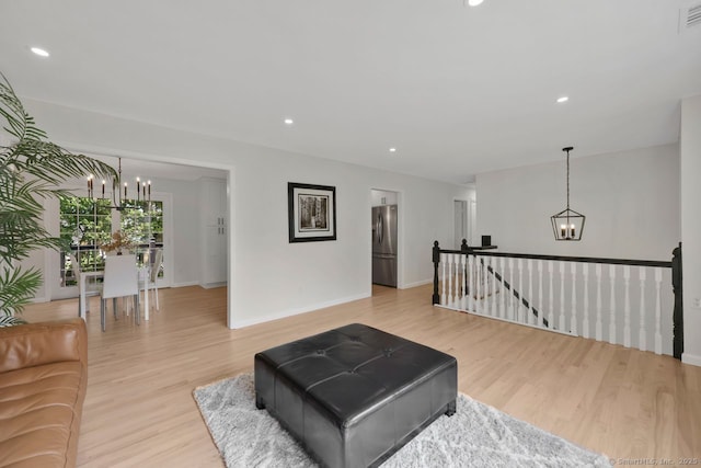 29 Magellan Dr, Milford, CT 06460 - living area with a chandelier, light wood-type flooring, and recessed lighting