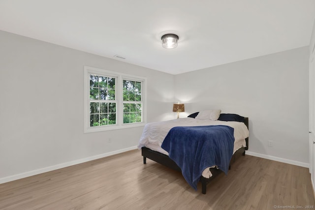 29 Magellan Dr, Milford, CT 06460 - bedroom featuring baseboards and wood finished floors