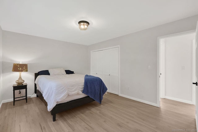 29 Magellan Dr, Milford, CT 06460 - bedroom with light wood-style floors and a closet