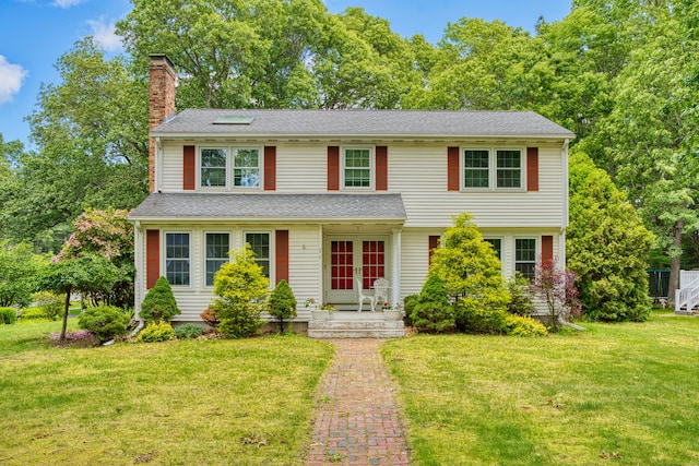 26 Lighthouse Hill Rd, Windsor, CT 06095 - view of front of property with french doors, a chimney, a front lawn, and a shingled roof
