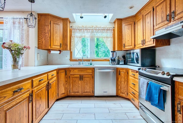 26 Lighthouse Hill Rd, Windsor, CT 06095 - kitchen with appliances with stainless steel finishes, a sink, under cabinet range hood, and light countertops