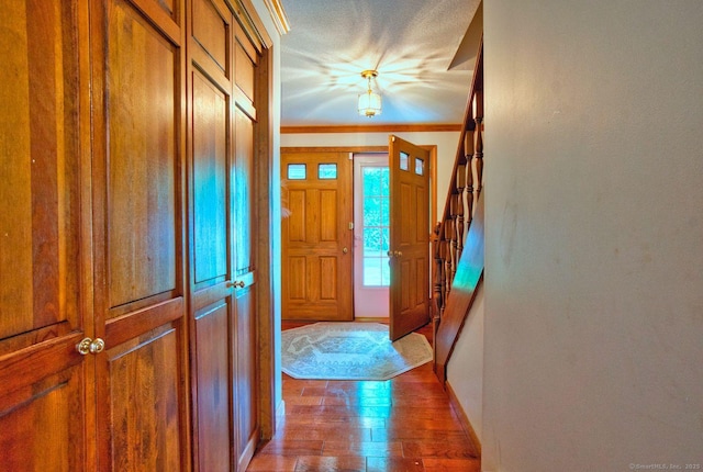 26 Lighthouse Hill Rd, Windsor, CT 06095 - entrance foyer with wood finished floors, stairs, and crown molding