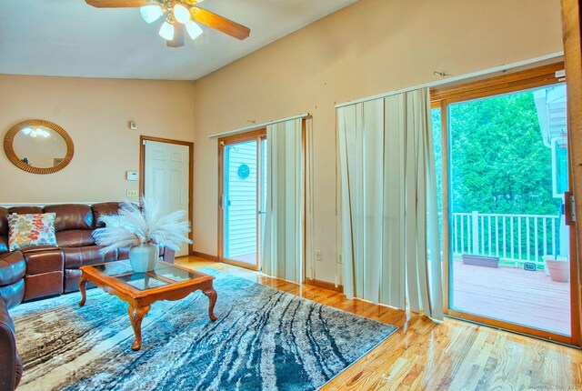 26 Lighthouse Hill Rd, Windsor, CT 06095 - living area featuring lofted ceiling, a ceiling fan, and wood finished floors