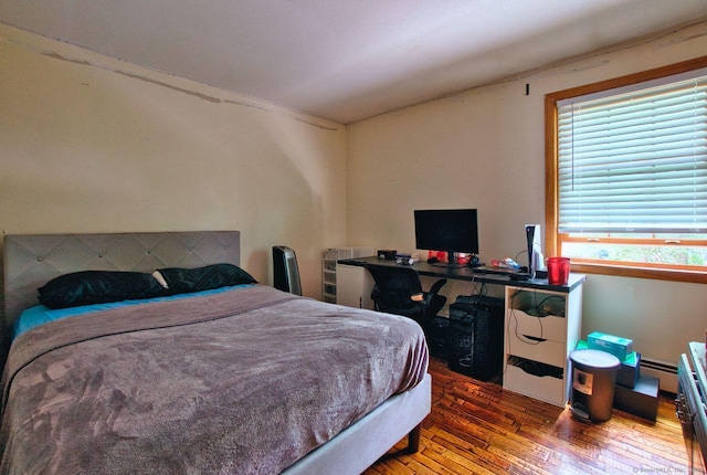 26 Lighthouse Hill Rd, Windsor, CT 06095 - bedroom with wood finished floors and baseboard heating