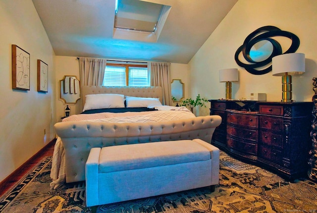 26 Lighthouse Hill Rd, Windsor, CT 06095 - bedroom with lofted ceiling, wood finished floors, and baseboards