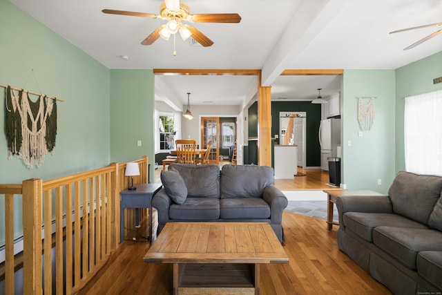 116 Grove St, Windsor Locks, CT 06096 - living room with ceiling fan, wood finished floors, and beamed ceiling