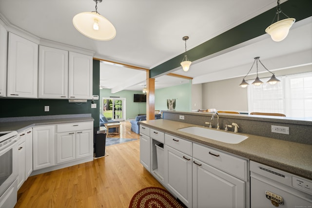 116 Grove St, Windsor Locks, CT 06096 - kitchen featuring a sink, light wood-style floors, white electric range oven, white cabinets, and pendant lighting