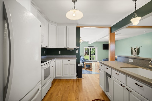 116 Grove St, Windsor Locks, CT 06096 - kitchen with white appliances, light wood finished floors, white cabinets, and hanging light fixtures