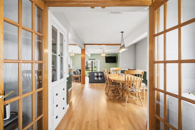 116 Grove St, Windsor Locks, CT 06096 - dining space featuring french doors, a ceiling fan, and light wood-style flooring
