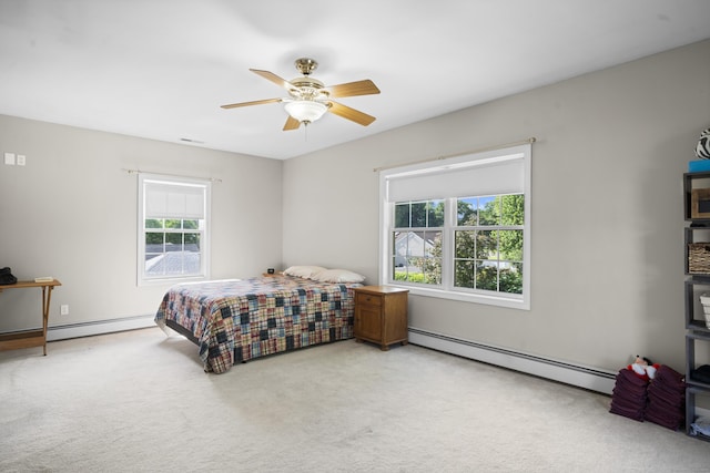 116 Grove St, Windsor Locks, CT 06096 - bedroom with a baseboard radiator, multiple windows, and light colored carpet