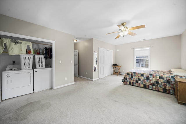 116 Grove St, Windsor Locks, CT 06096 - carpeted bedroom featuring washer and clothes dryer, multiple closets, baseboards, and ceiling fan