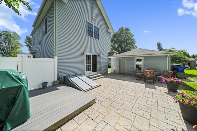 116 Grove St, Windsor Locks, CT 06096 - back of house with a patio, outdoor dining space, a wooden deck, and an outdoor structure