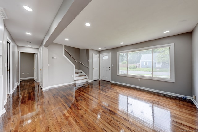 379 Belden Rd, Hamden, CT 06514 - entrance foyer with wood finished floors, baseboards, stairway, and recessed lighting