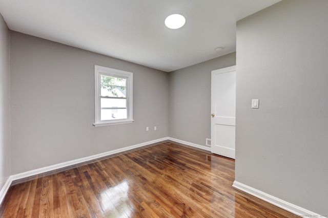 379 Belden Rd, Hamden, CT 06514 - empty room with baseboards and wood finished floors