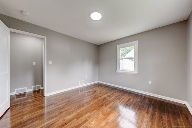 379 Belden Rd, Hamden, CT 06514 - spare room with wood finished floors and baseboards