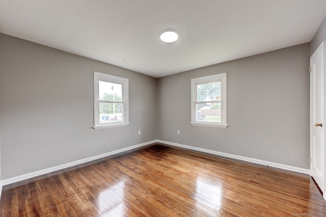 379 Belden Rd, Hamden, CT 06514 - unfurnished room featuring healthy amount of natural light, baseboards, and wood finished floors
