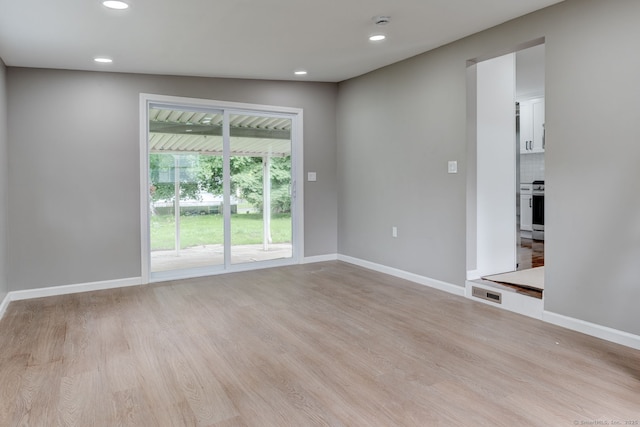 379 Belden Rd, Hamden, CT 06514 - empty room featuring light wood finished floors, baseboards, recessed lighting, and a smoke detector