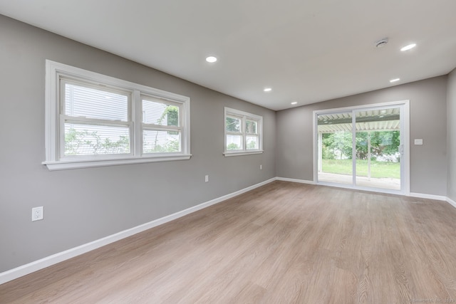 379 Belden Rd, Hamden, CT 06514 - empty room featuring light wood finished floors, baseboards, recessed lighting, and a smoke detector