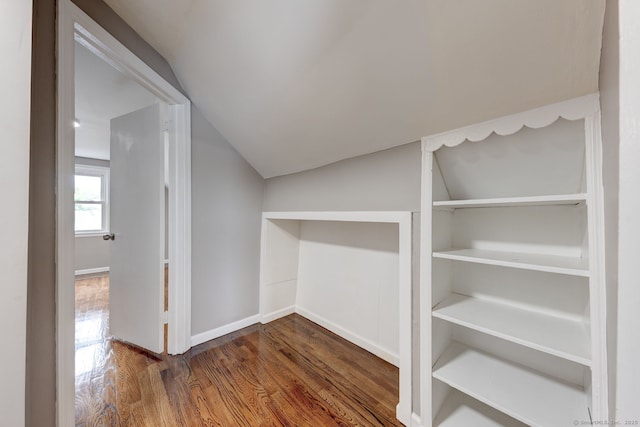 379 Belden Rd, Hamden, CT 06514 - corridor with vaulted ceiling, dark wood-style flooring, and baseboards
