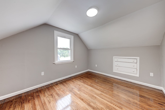 379 Belden Rd, Hamden, CT 06514 - bonus room featuring wood finished floors, baseboards, and lofted ceiling