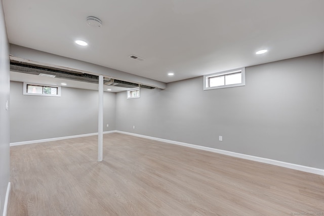 379 Belden Rd, Hamden, CT 06514 - basement with light wood-style flooring, recessed lighting, healthy amount of natural light, and baseboards