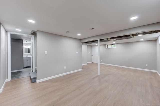 379 Belden Rd, Hamden, CT 06514 - below grade area with light wood-type flooring, recessed lighting, and baseboards