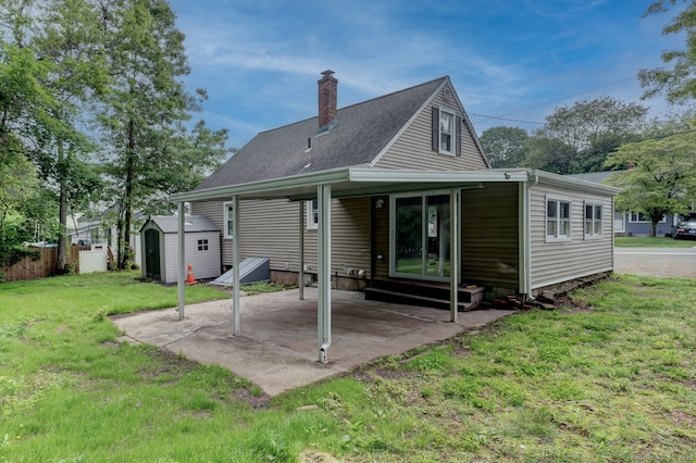 379 Belden Rd, Hamden, CT 06514 - back of house featuring entry steps, a patio area, and a chimney