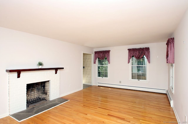 467 Weekeepeemee Rd, Woodbury, CT 06798 - unfurnished living room featuring a baseboard radiator, wood finished floors, and a fireplace
