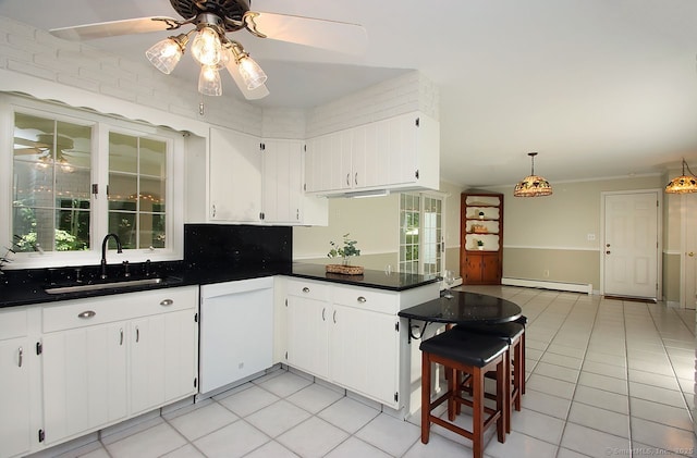 467 Weekeepeemee Rd, Woodbury, CT 06798 - kitchen with dishwasher, baseboard heating, a ceiling fan, and light tile patterned floors
