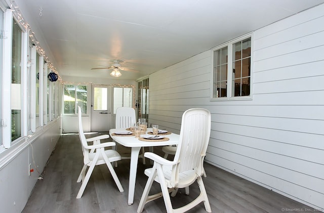 467 Weekeepeemee Rd, Woodbury, CT 06798 - sunroom / solarium featuring ceiling fan, wood finished floors, outdoor dining space, and wooden walls