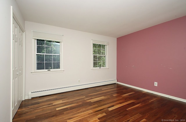 467 Weekeepeemee Rd, Woodbury, CT 06798 - spare room featuring a baseboard heating unit, wood finished floors, and baseboards