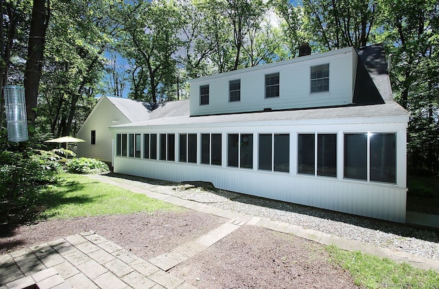 467 Weekeepeemee Rd, Woodbury, CT 06798 - rear view of house featuring a sunroom, a chimney, and a shingled roof