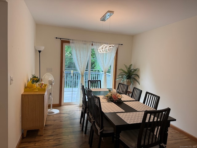 218 Fish Rock Rd, Southbury, CT 06488 - dining space featuring wood finished floors, a chandelier, and baseboards