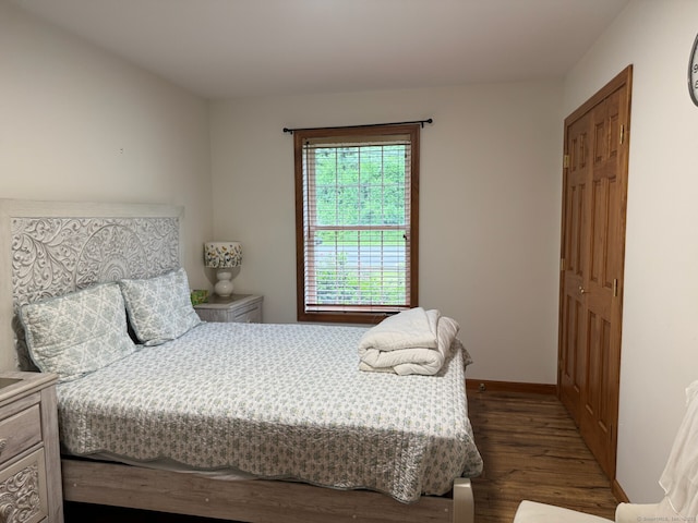 218 Fish Rock Rd, Southbury, CT 06488 - bedroom with dark wood-style flooring and baseboards