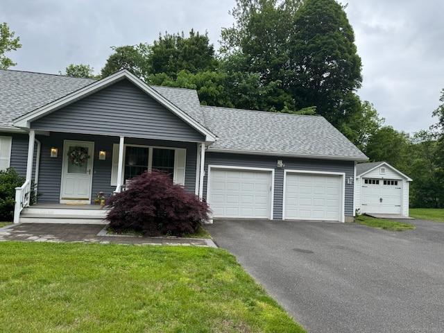 218 Fish Rock Rd, Southbury, CT 06488 - single story home with a shingled roof, an attached garage, asphalt driveway, covered porch, and a front yard