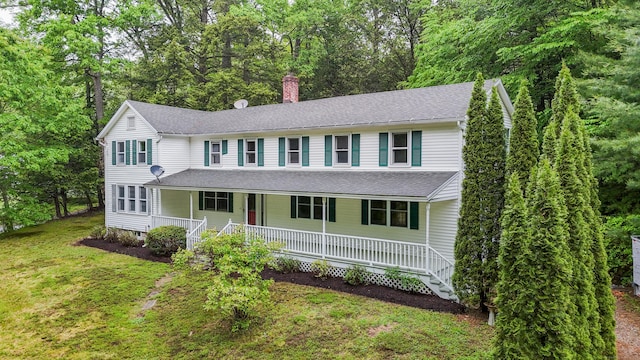 15 Indian Hill Rd, Canton, CT 06019 - view of front of house with a porch, a chimney, a shingled roof, a front yard, and stairs