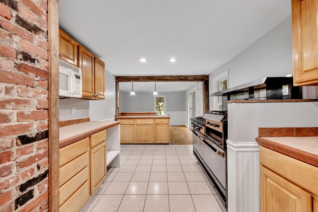 15 Indian Hill Rd, Canton, CT 06019 - kitchen with white microwave, recessed lighting, light brown cabinets, light tile patterned floors, and pendant lighting