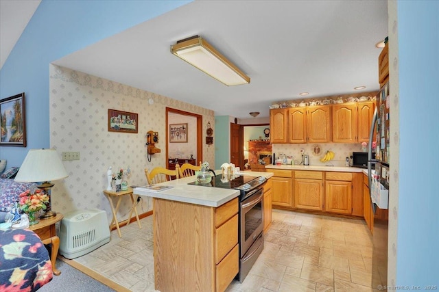 79 Carriage Dr E, Meriden, CT 06450 - kitchen with stainless steel electric range, light countertops, a kitchen island, black microwave, and recessed lighting
