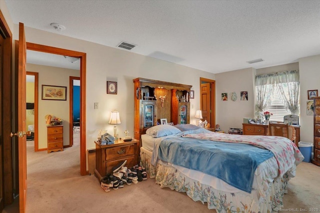 79 Carriage Dr E, Meriden, CT 06450 - bedroom with light carpet and a textured ceiling