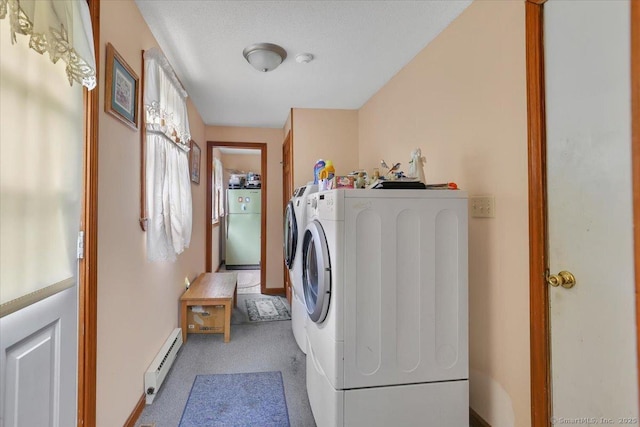 79 Carriage Dr E, Meriden, CT 06450 - laundry area featuring a baseboard heating unit, light carpet, and washer and clothes dryer