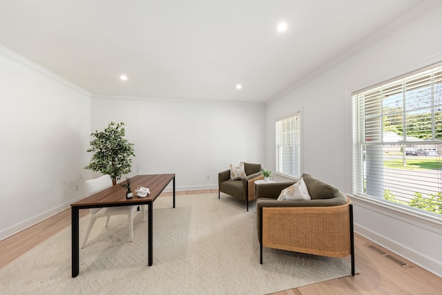 31 Pleasant St, Darien, CT 06820 - living room with crown molding, light wood finished floors, baseboards, and recessed lighting