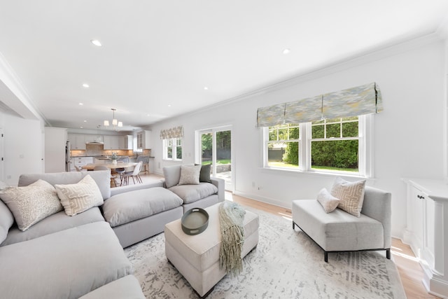 31 Pleasant St, Darien, CT 06820 - living room featuring crown molding, recessed lighting, a chandelier, light wood finished floors, and baseboards