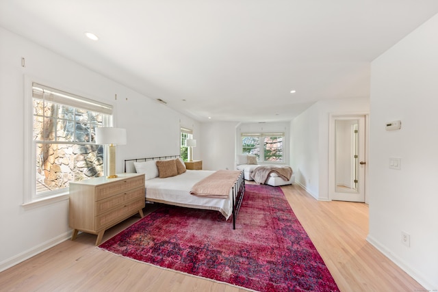 31 Pleasant St, Darien, CT 06820 - bedroom with light wood-style flooring, baseboards, and recessed lighting