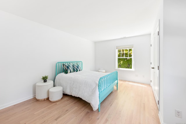 31 Pleasant St, Darien, CT 06820 - bedroom featuring light wood-style flooring and baseboards