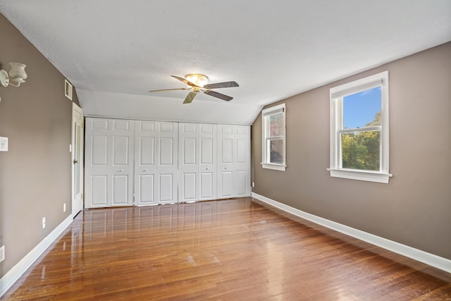 40A Mount Pleasant Rd, Newtown, CT 06470 - unfurnished bedroom featuring wood finished floors, baseboards, lofted ceiling, and ceiling fan
