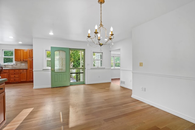 40A Mount Pleasant Rd, Newtown, CT 06470 - unfurnished dining area featuring a chandelier, baseboards, light wood-style floors, and recessed lighting