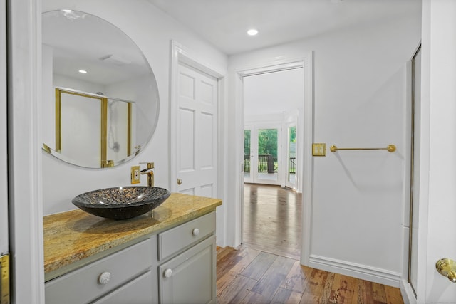 40A Mount Pleasant Rd, Newtown, CT 06470 - full bathroom featuring wood finished floors, vanity, a shower stall, and recessed lighting
