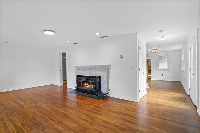 40A Mount Pleasant Rd, Newtown, CT 06470 - unfurnished living room with wood finished floors, a fireplace, baseboards, recessed lighting, and ornamental molding