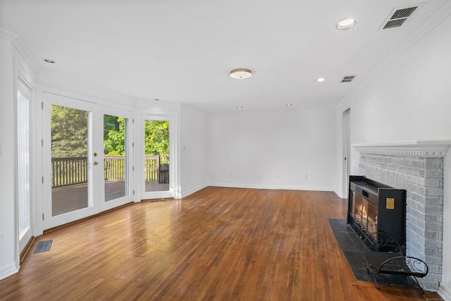 40A Mount Pleasant Rd, Newtown, CT 06470 - unfurnished living room featuring wood finished floors, ornamental molding, a brick fireplace, baseboards, and recessed lighting