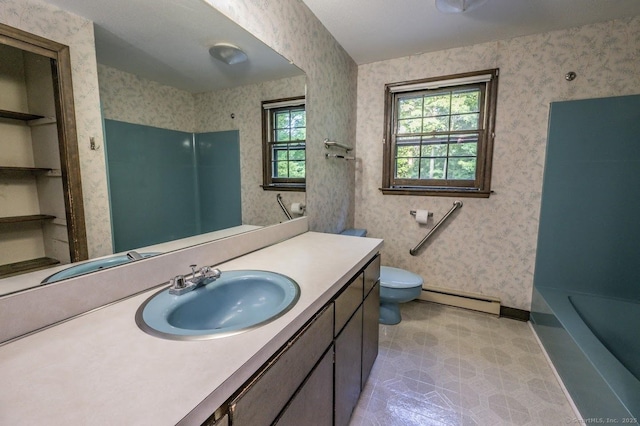 58 Wildwood Ln, Durham, CT 06422 - full bath featuring a baseboard radiator, vanity, toilet, wallpapered walls, and baseboards
